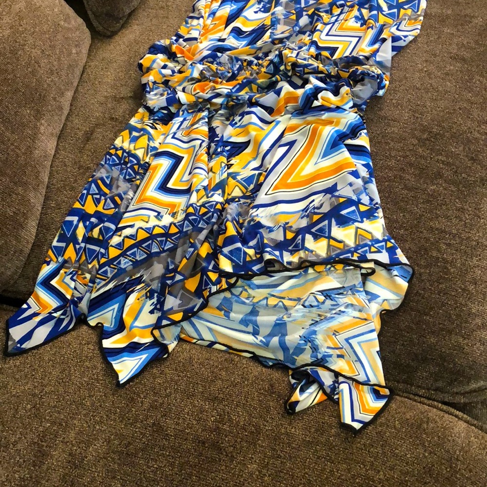 Multicolor dress sleeveless elastic in the middle one size fits all polyester .